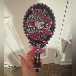 Monster High Draculaura themed hand mirror